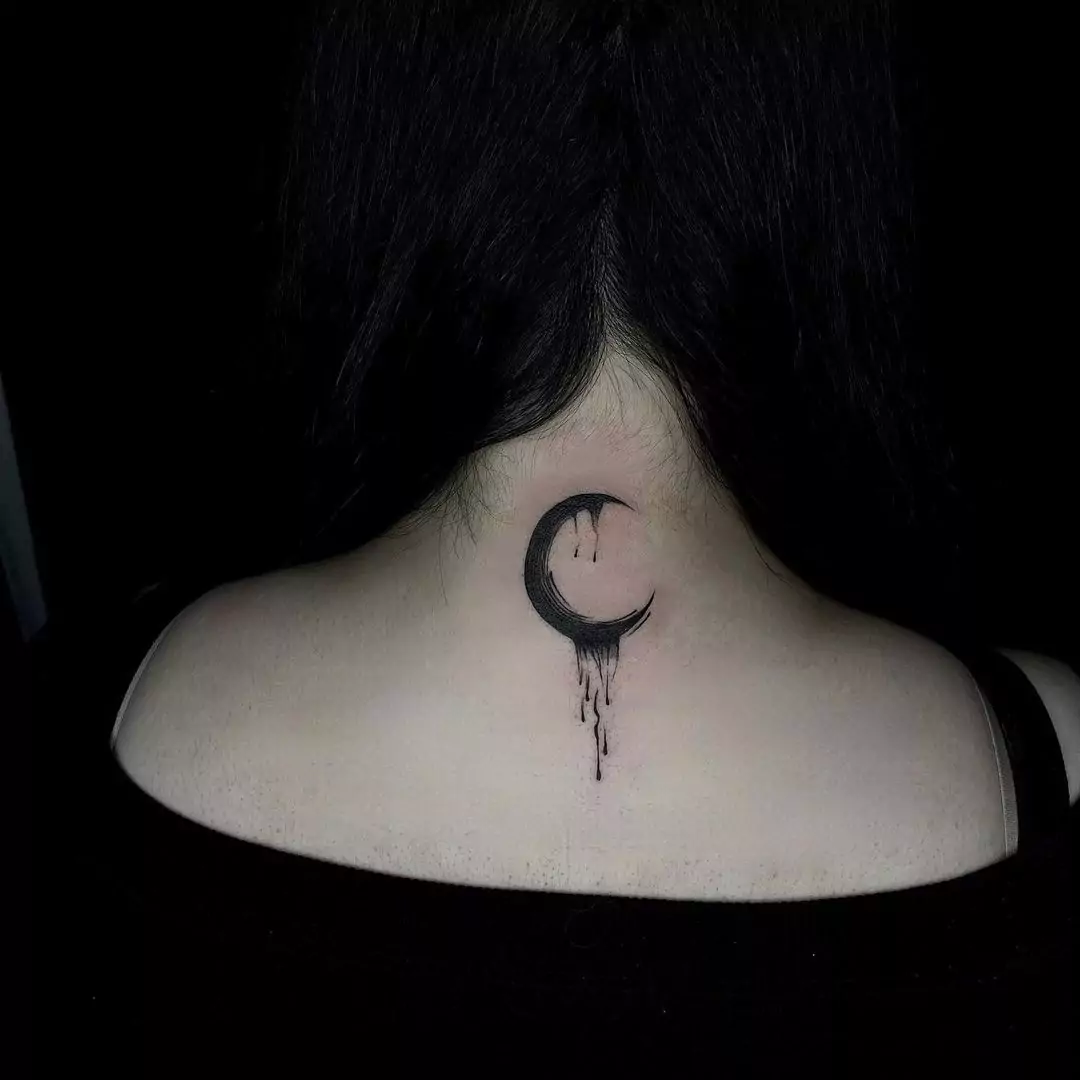 black moon tattoo on the nape