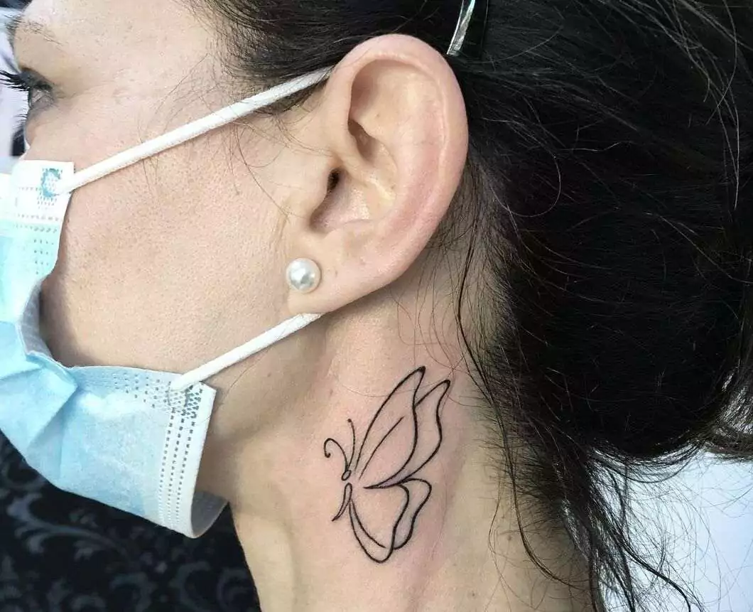 butterfly neck tattoo