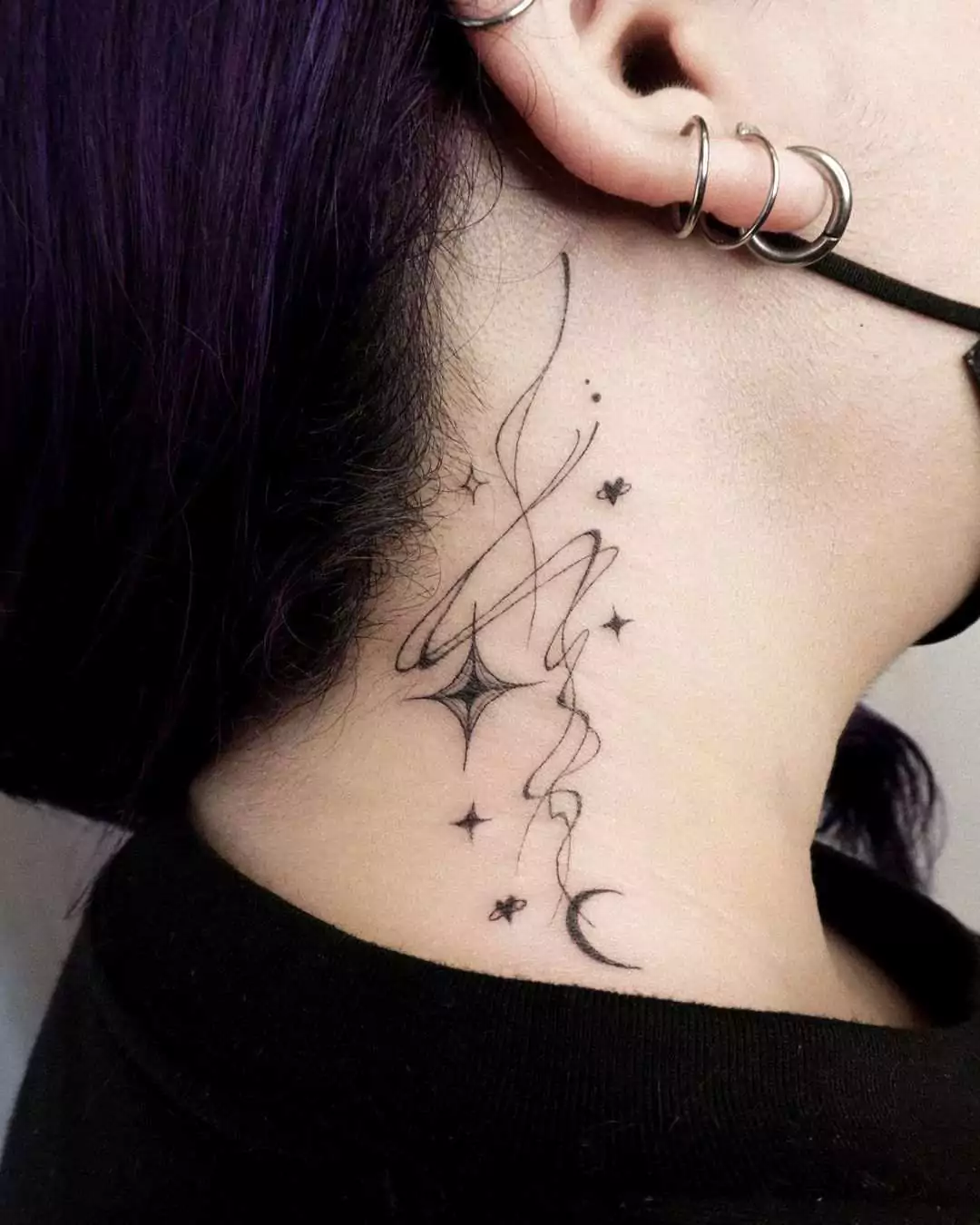 cosmic elements tattoo on neck