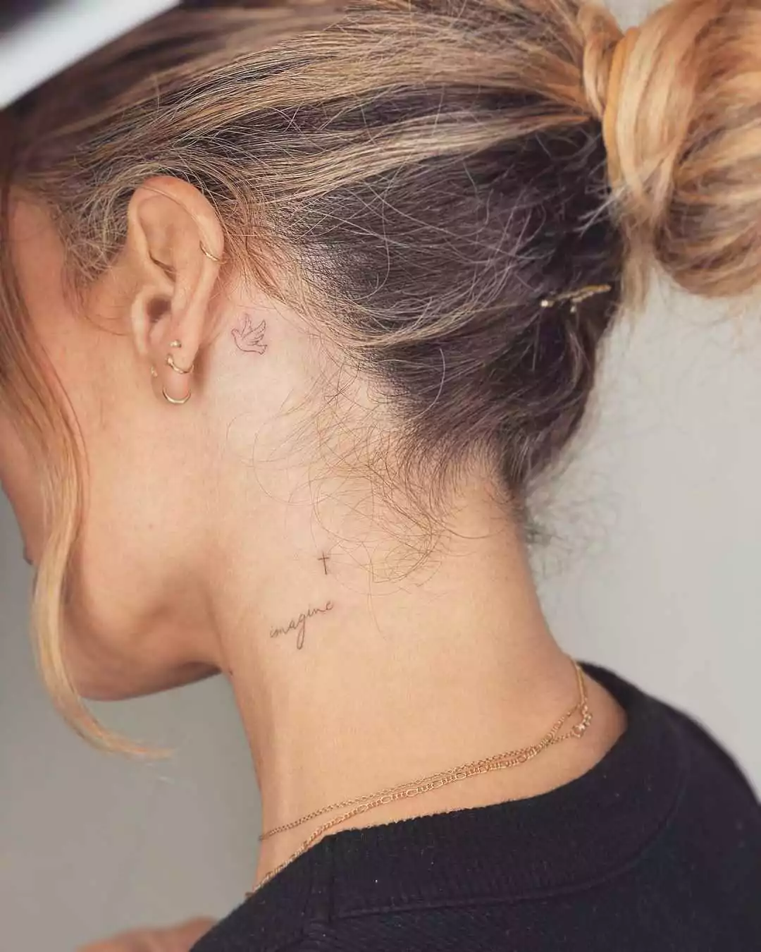 cute elements tattoo on the neck