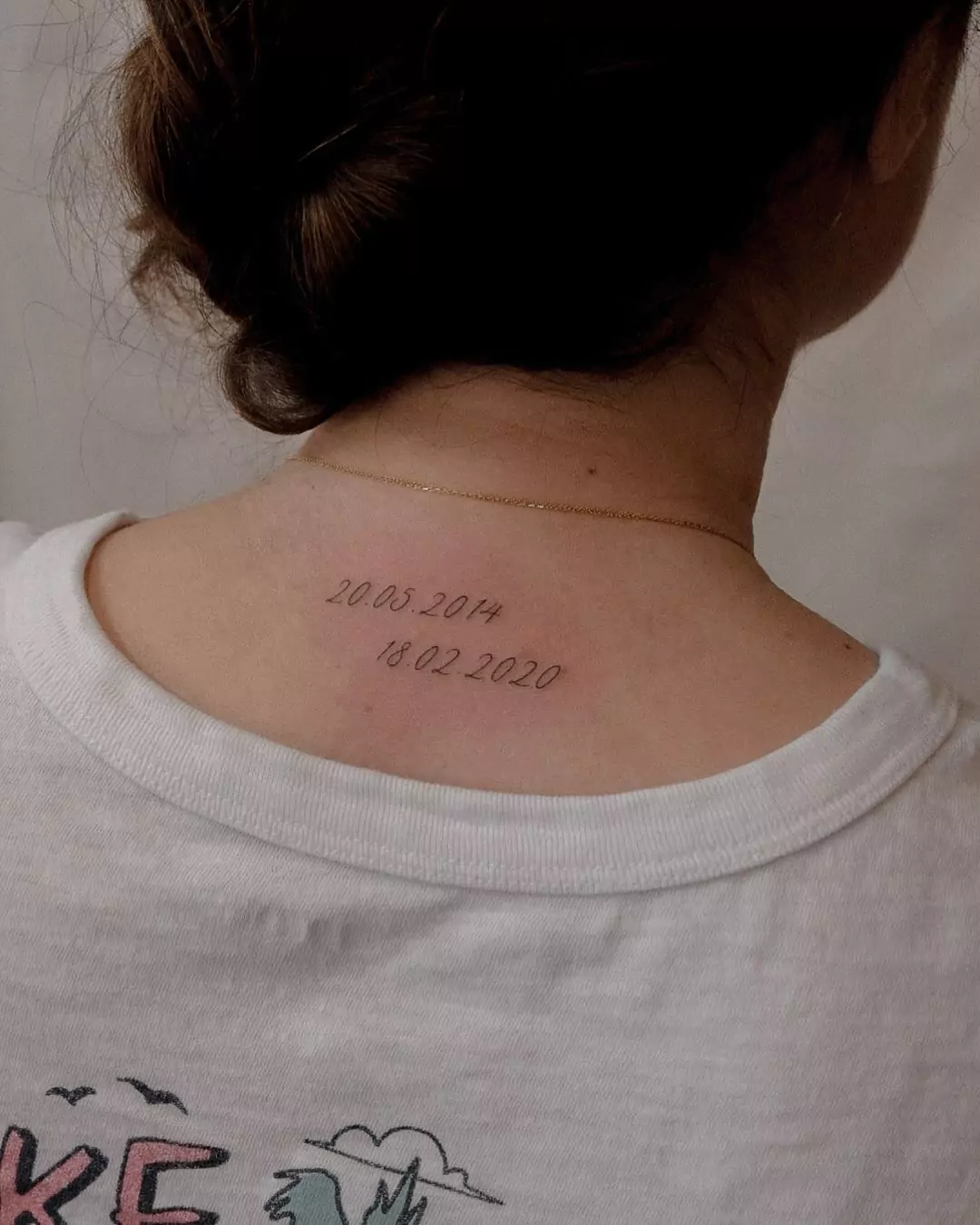 date of birth nape tattoo