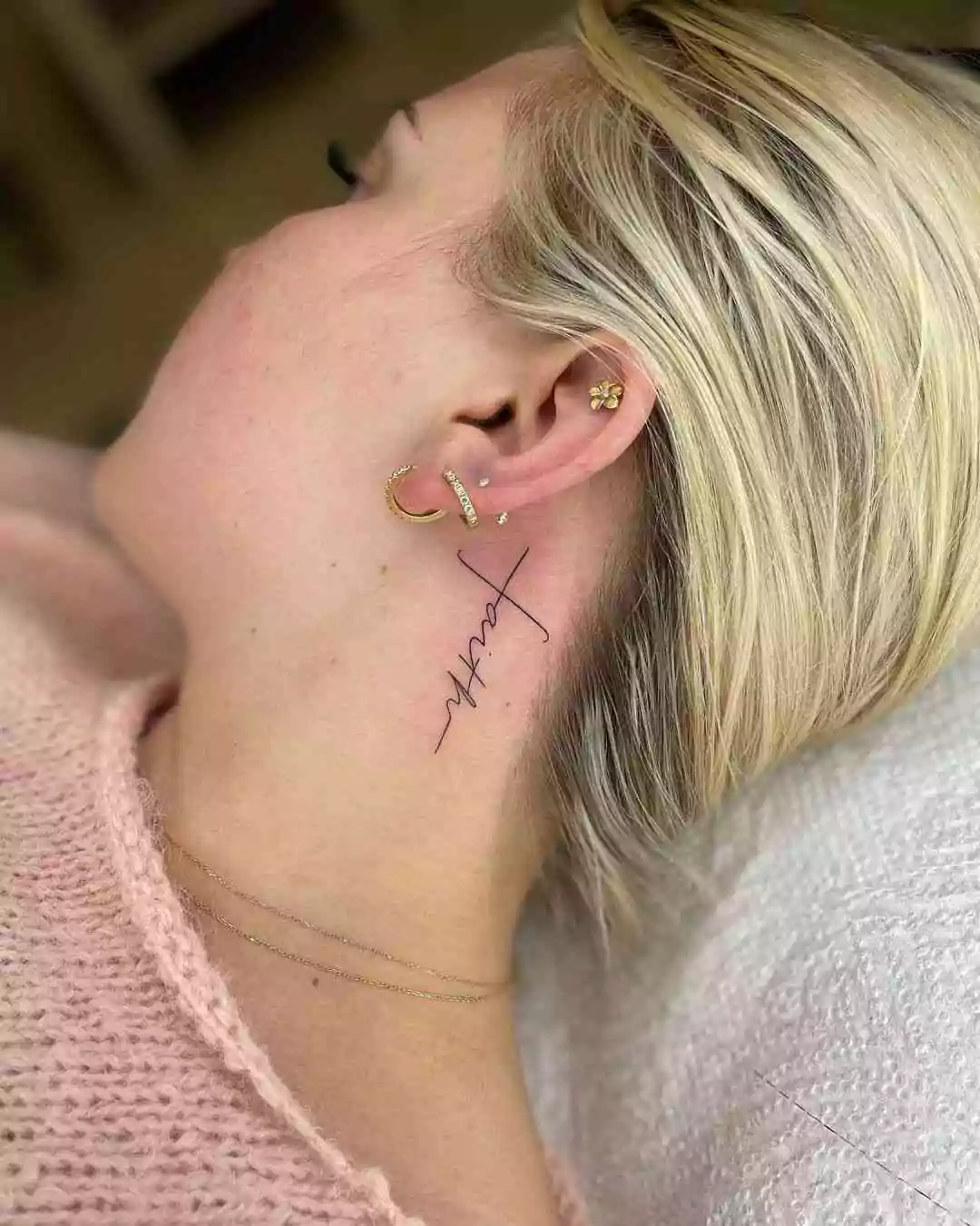 faith neck tattoo