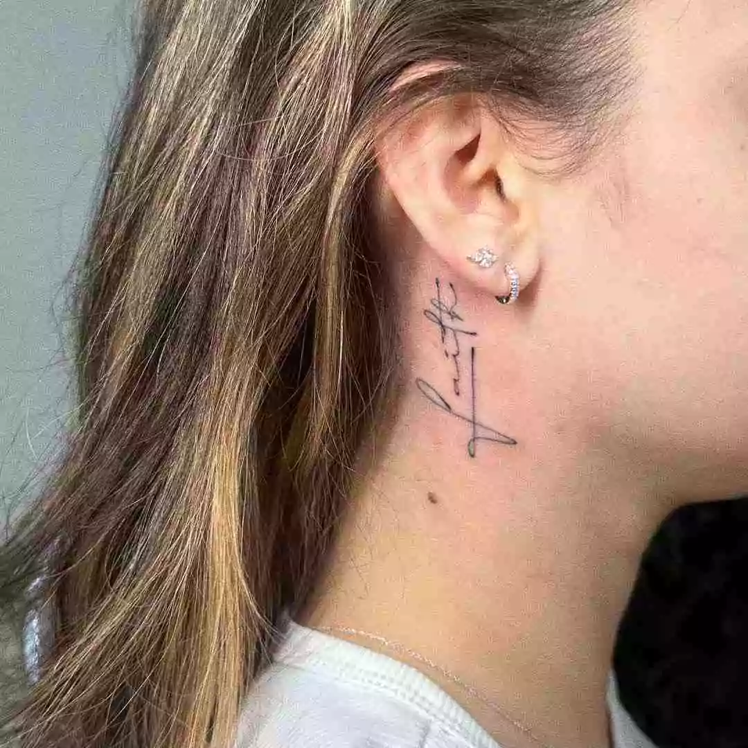 faith word neck tattoo for women