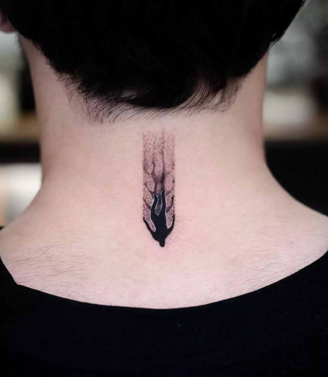 falling tattoo on nape