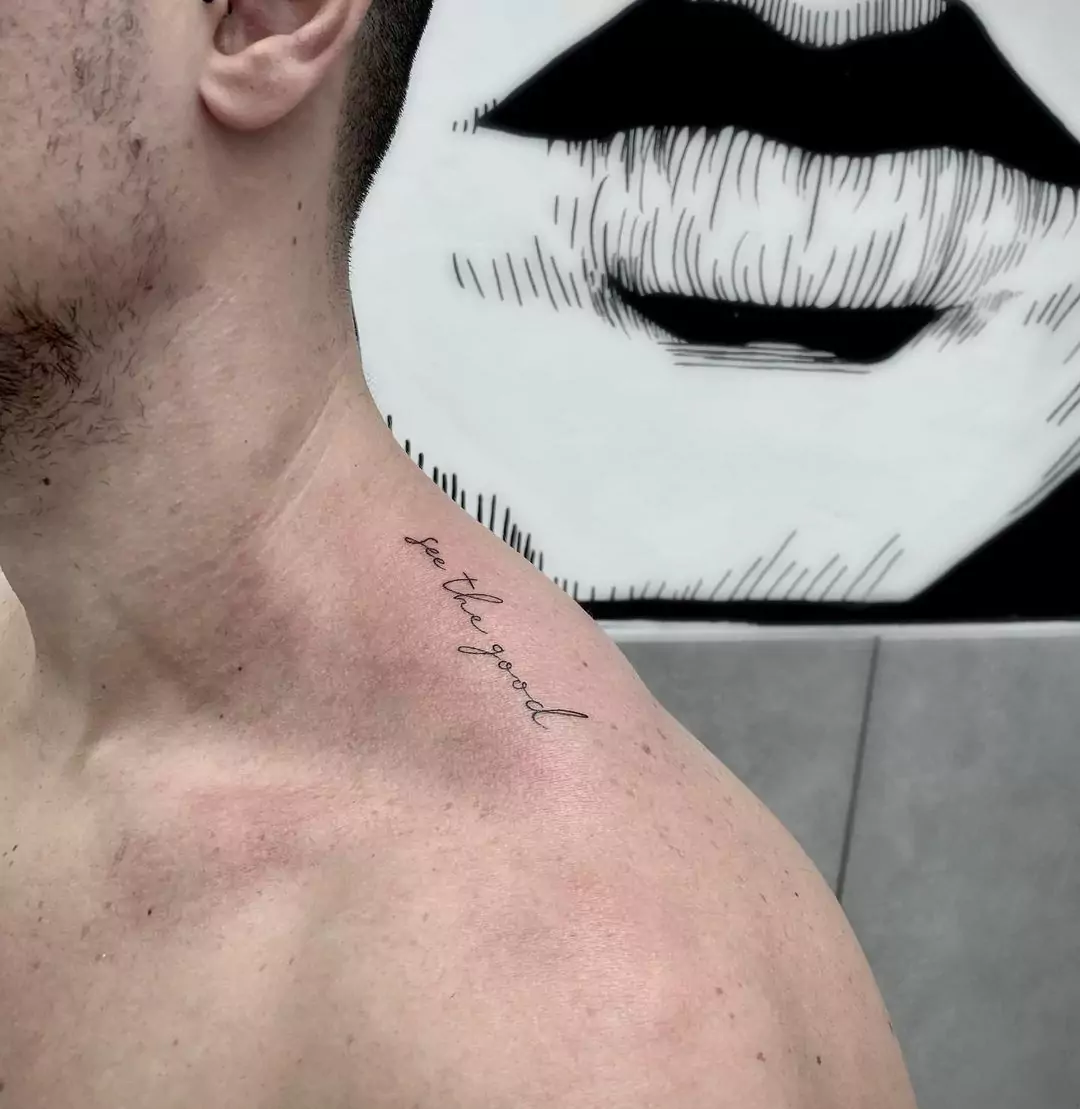 positivity tattoo on the neck