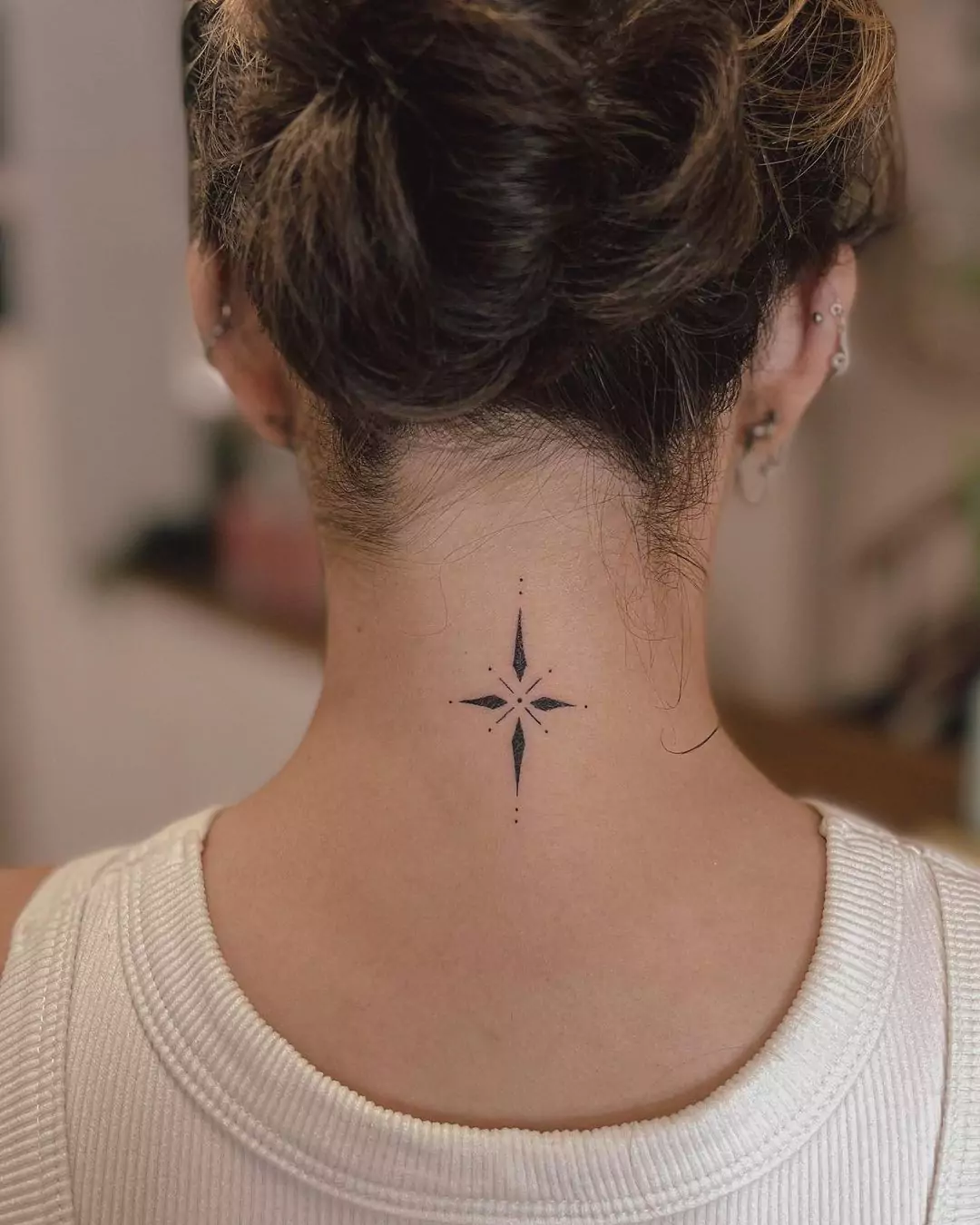 simple element neck tattoo