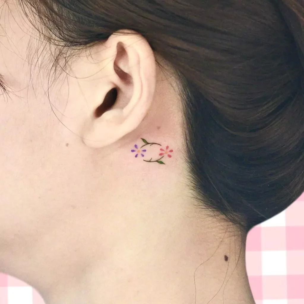 tiny tattoos on the neck