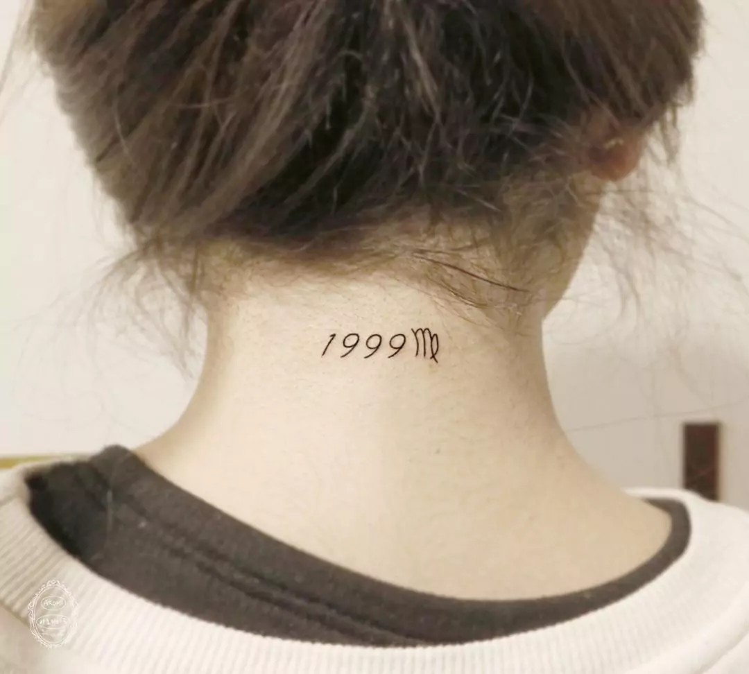 year and zodiac sign tattoo