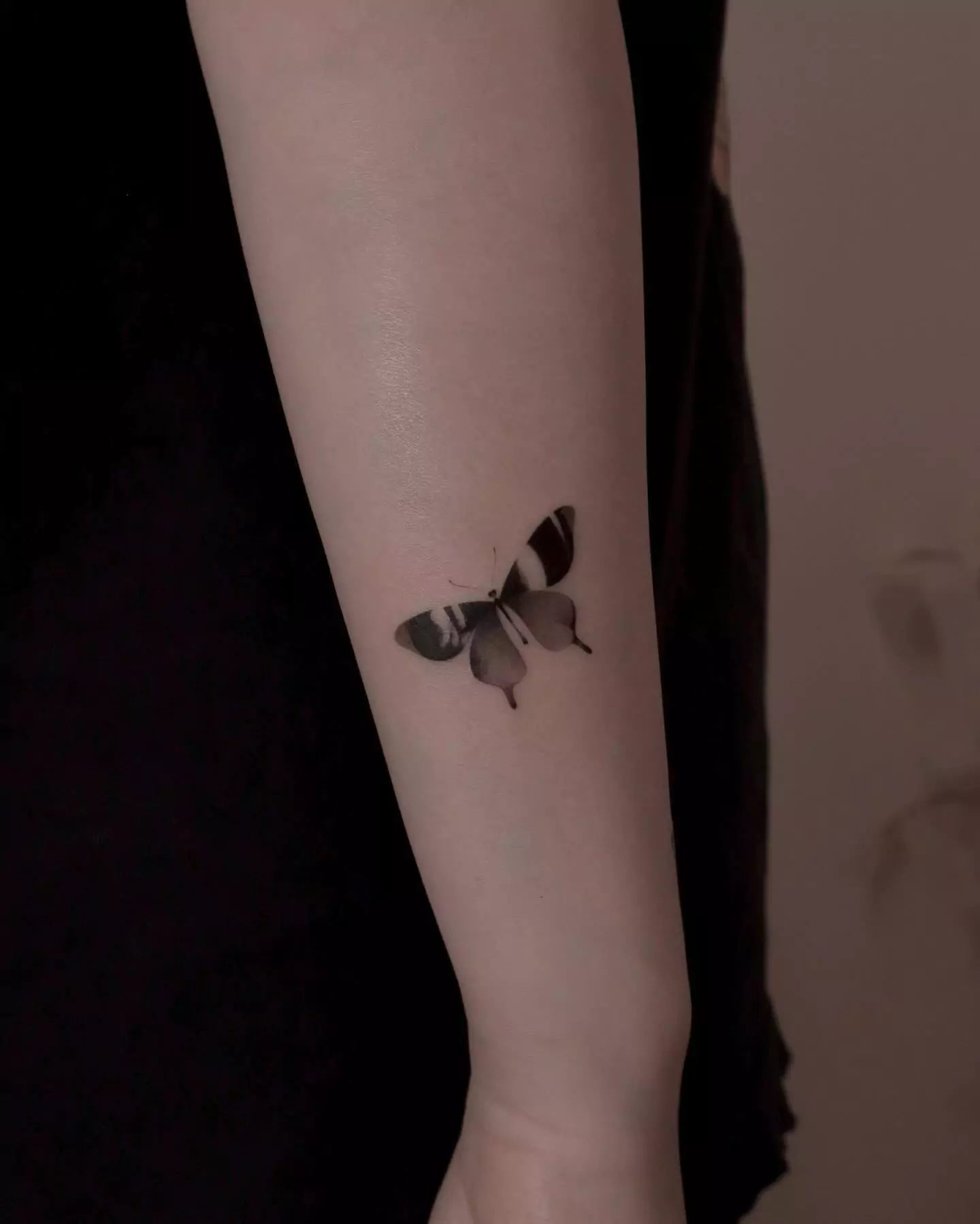 abstract style butterfly tattoo