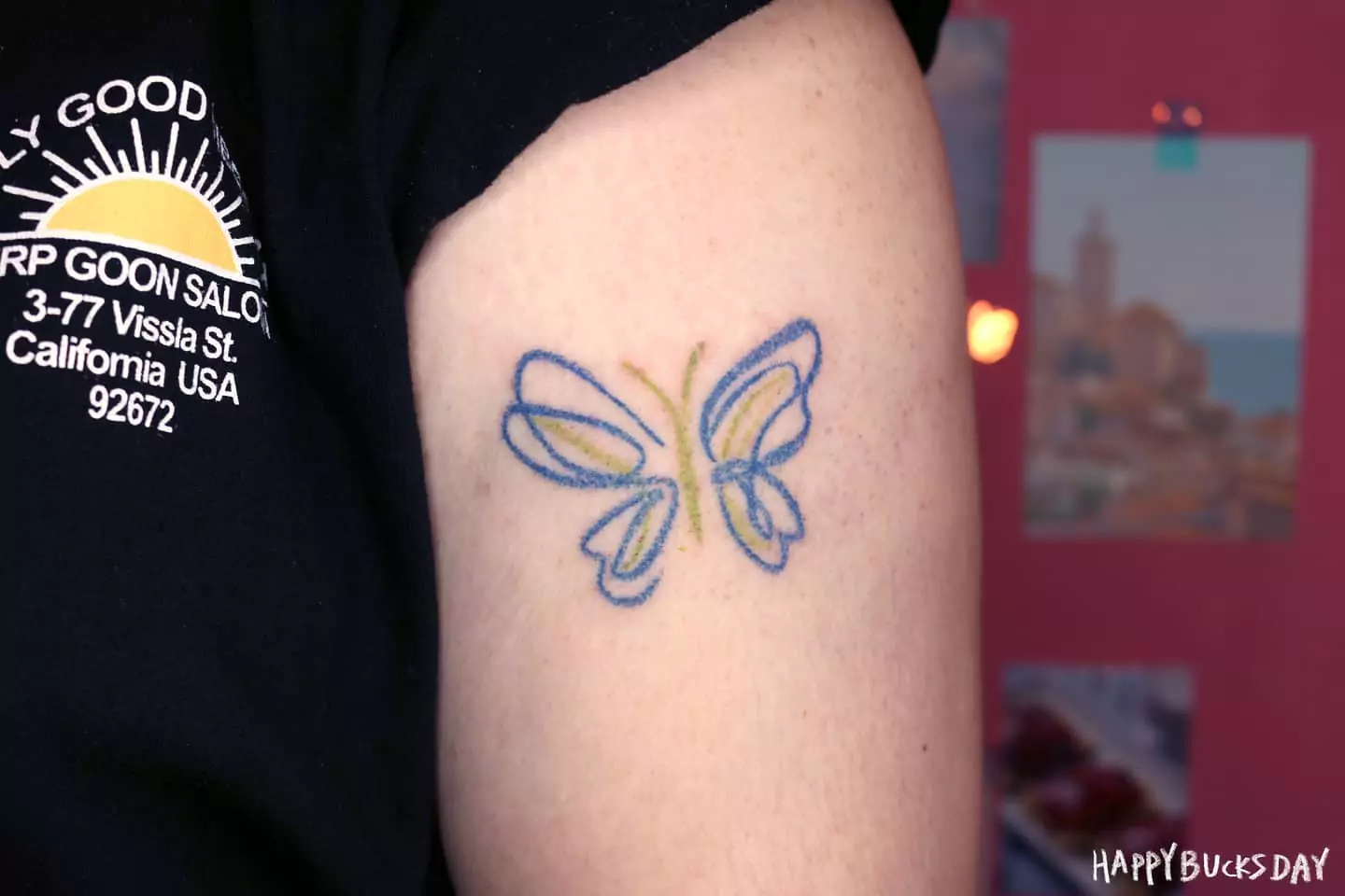 blue green butterfly tattoo