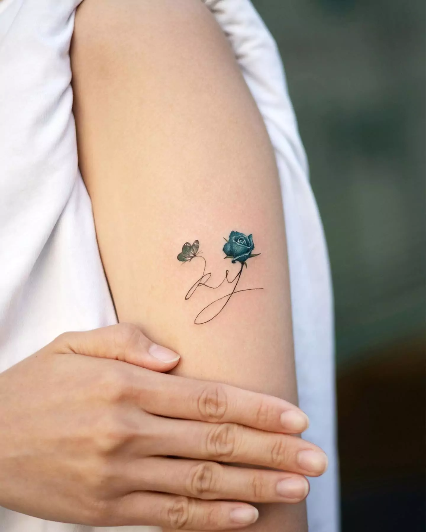 blue rose and butterfly tattoo