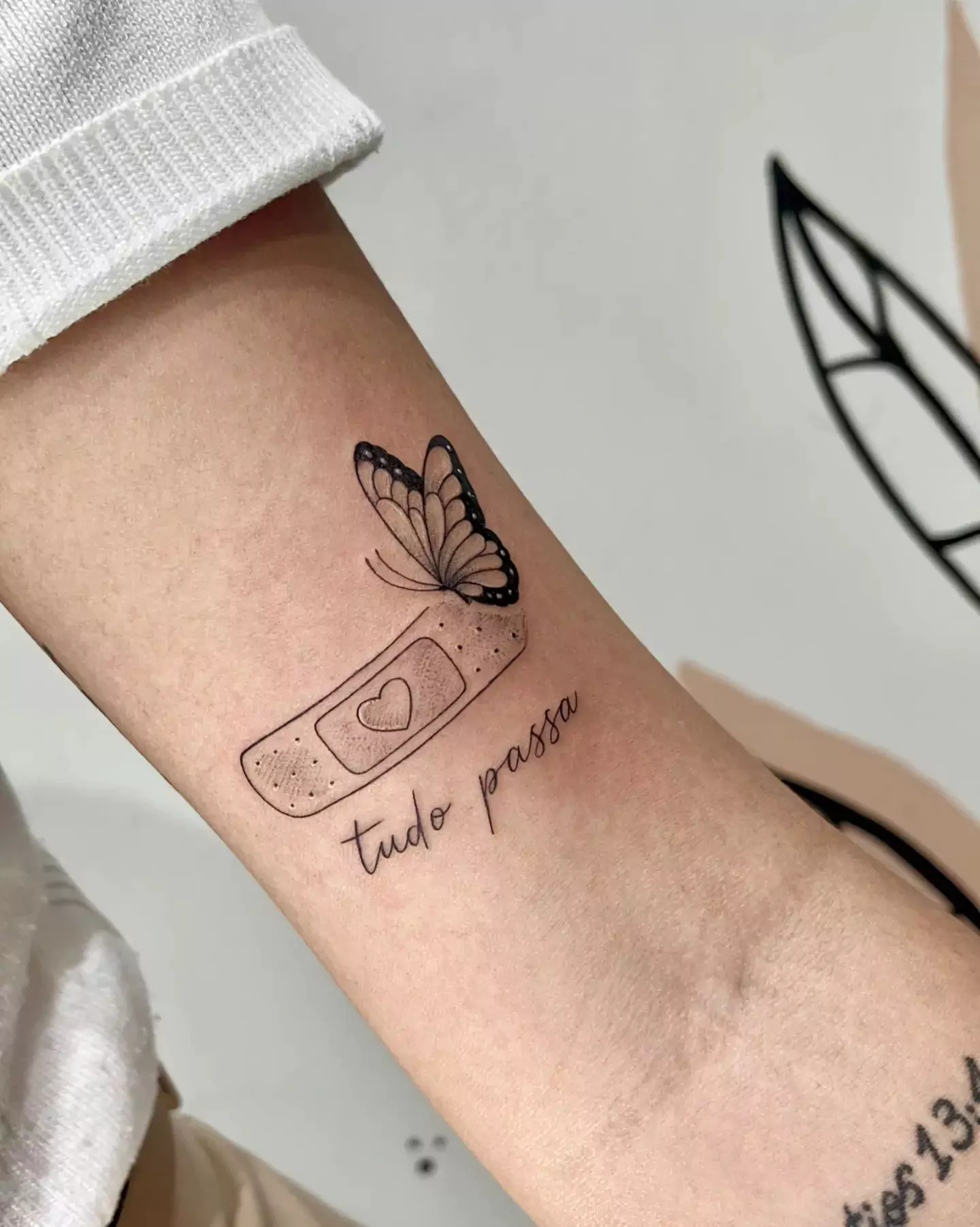 butterfly and band tattoo