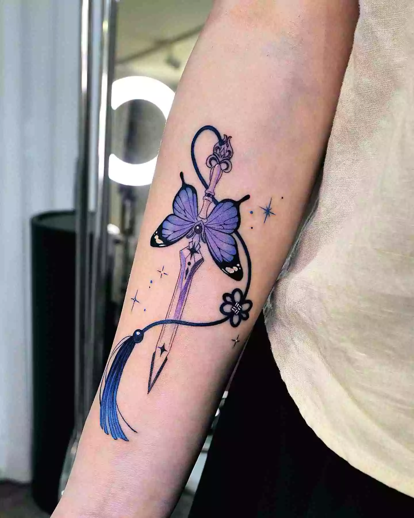 butterfly and dagger tattoo