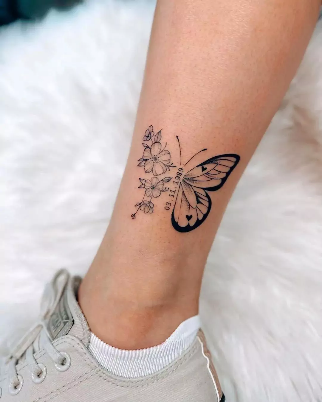 butterfly and date tattoo