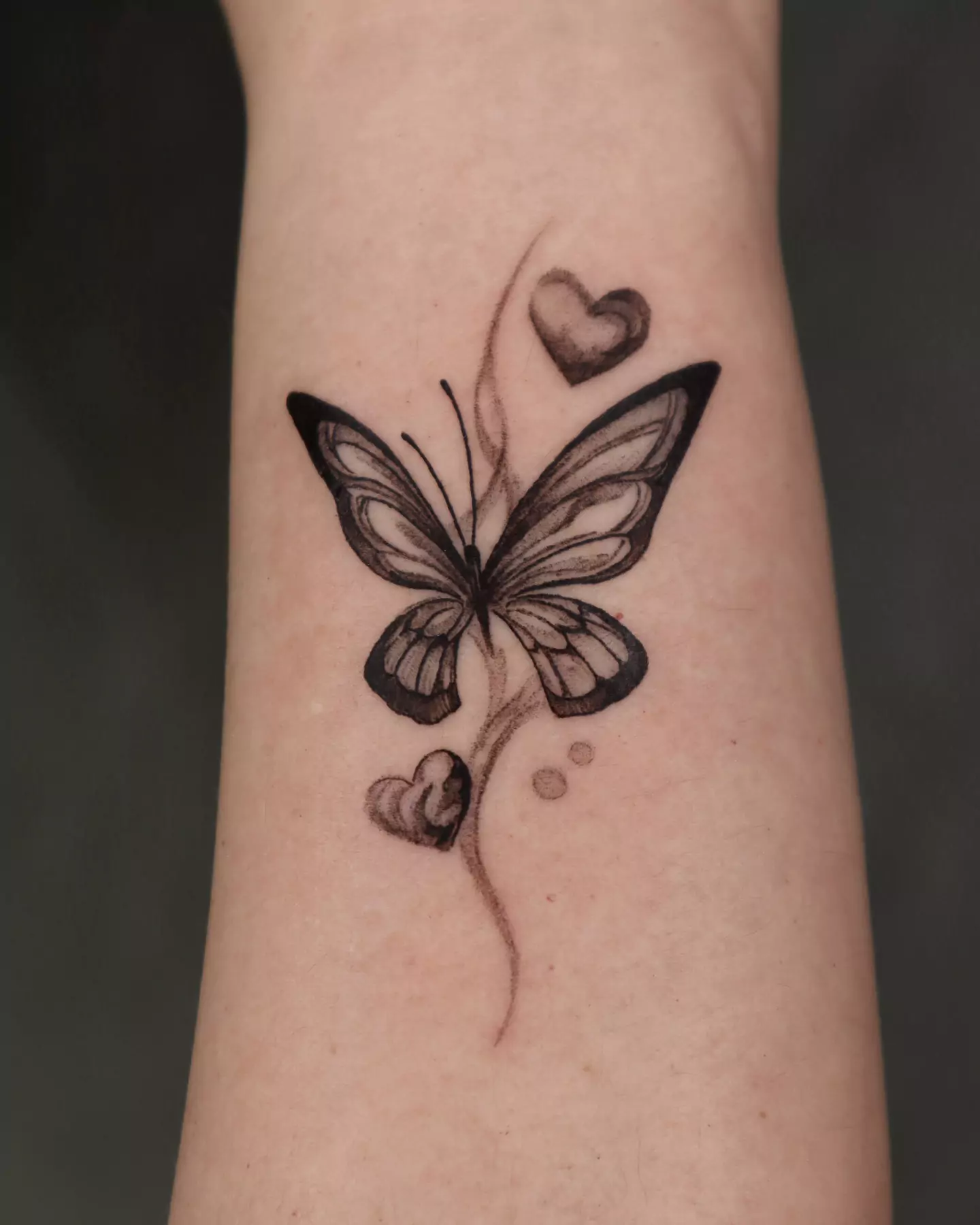 butterfly and heart tattoo