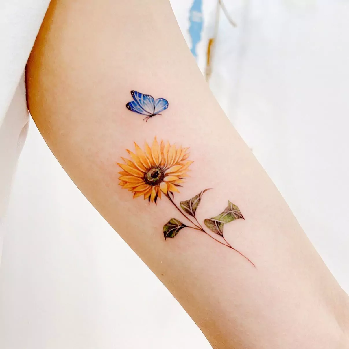 butterfly and sun flower tattoo