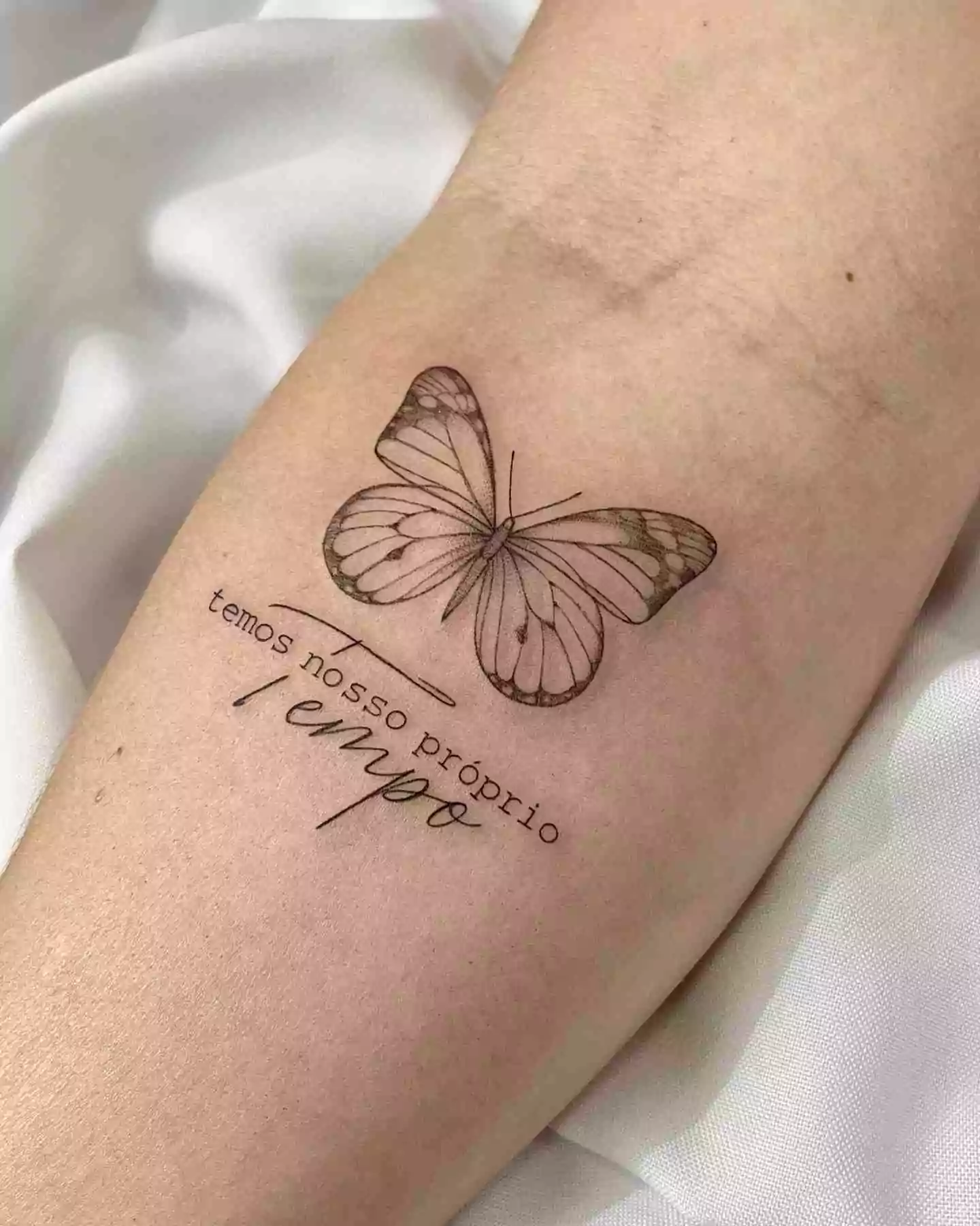 butterfly hand tattoo