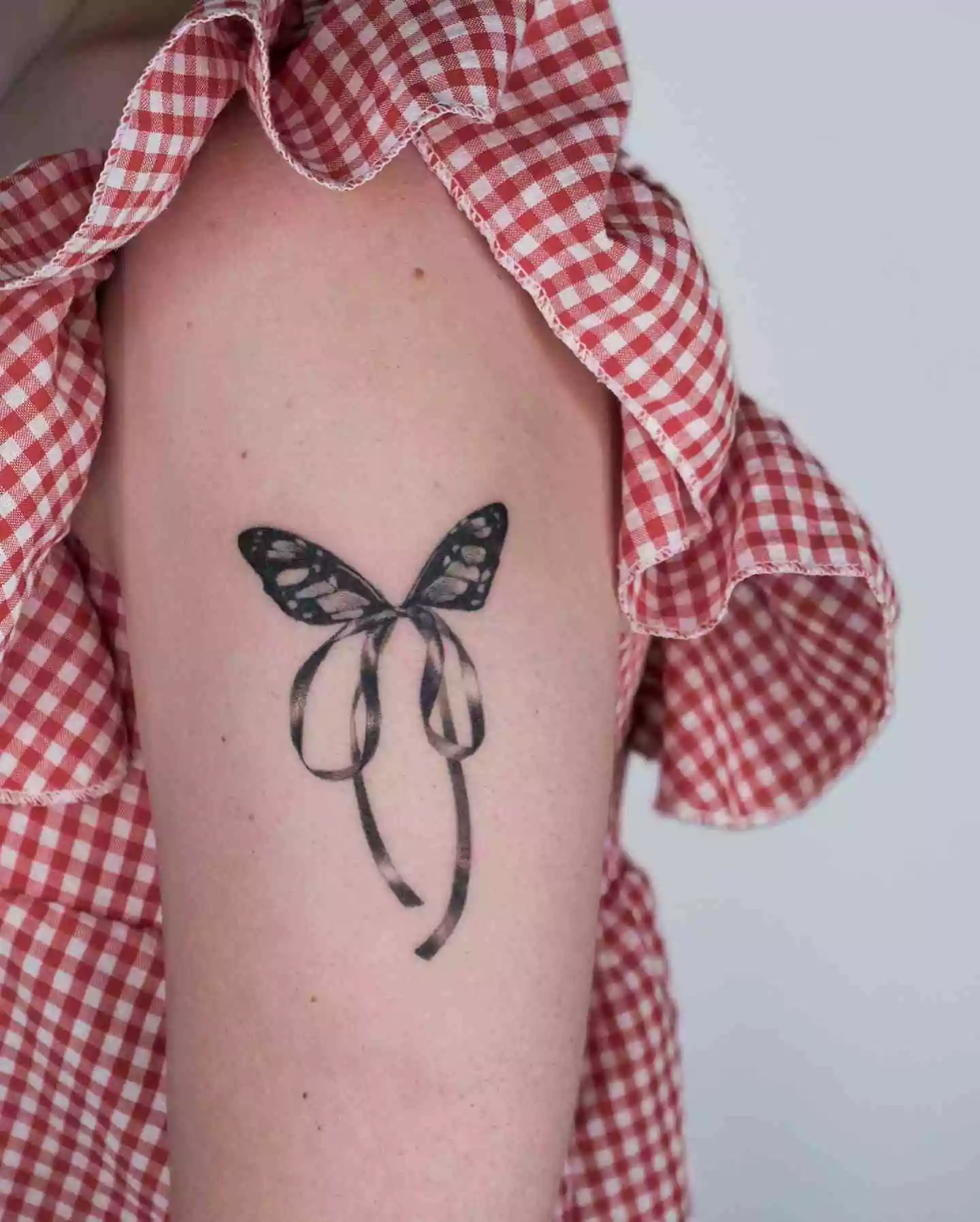 butterfly tattoo in ribbon style