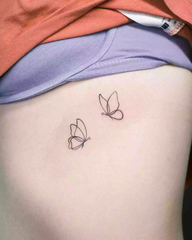 butterfly tattoo on rib