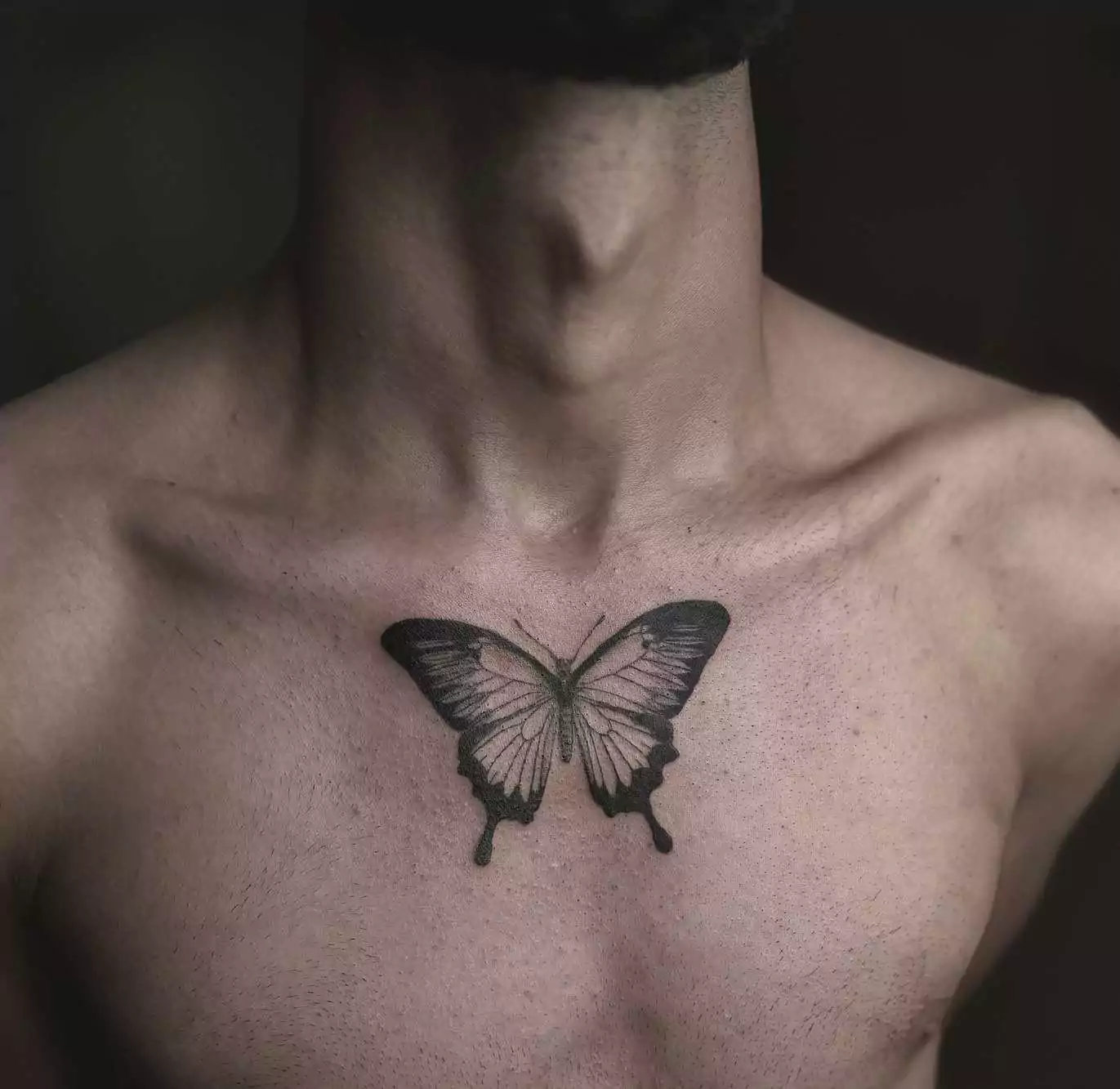 butterfly tattoo on the collarbone