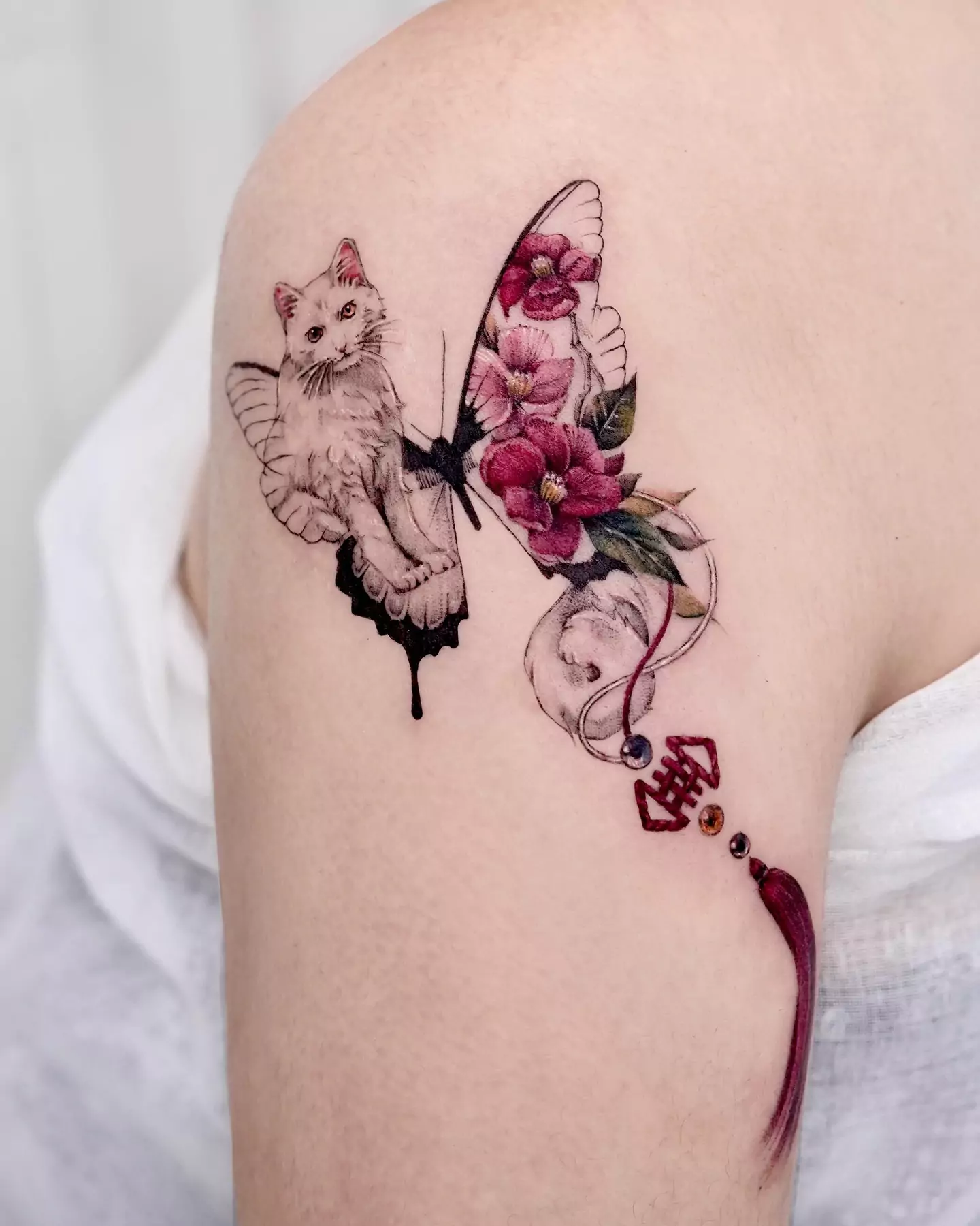 cat and butterfly tattoo