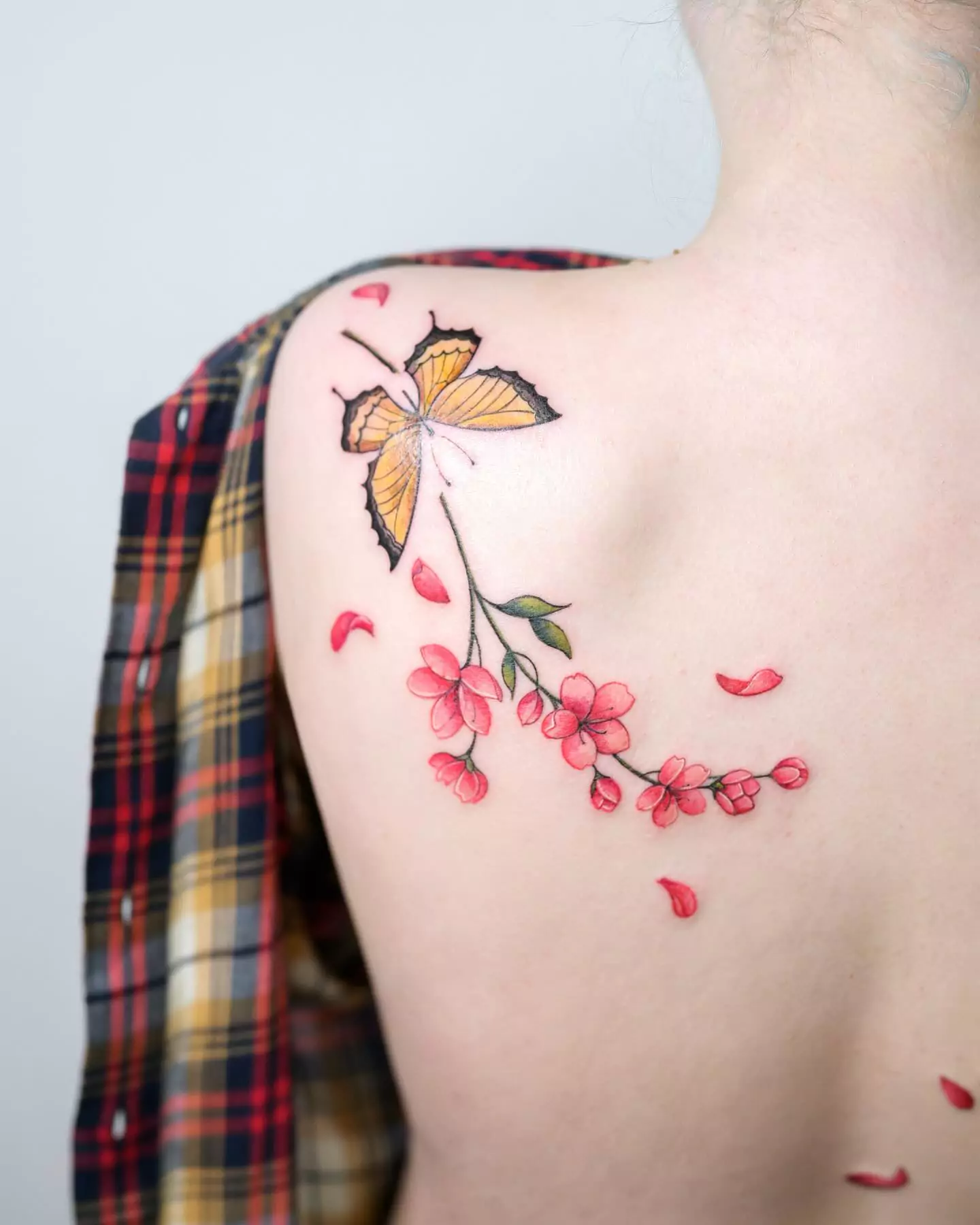 cherry blossom and butterfly tattoo