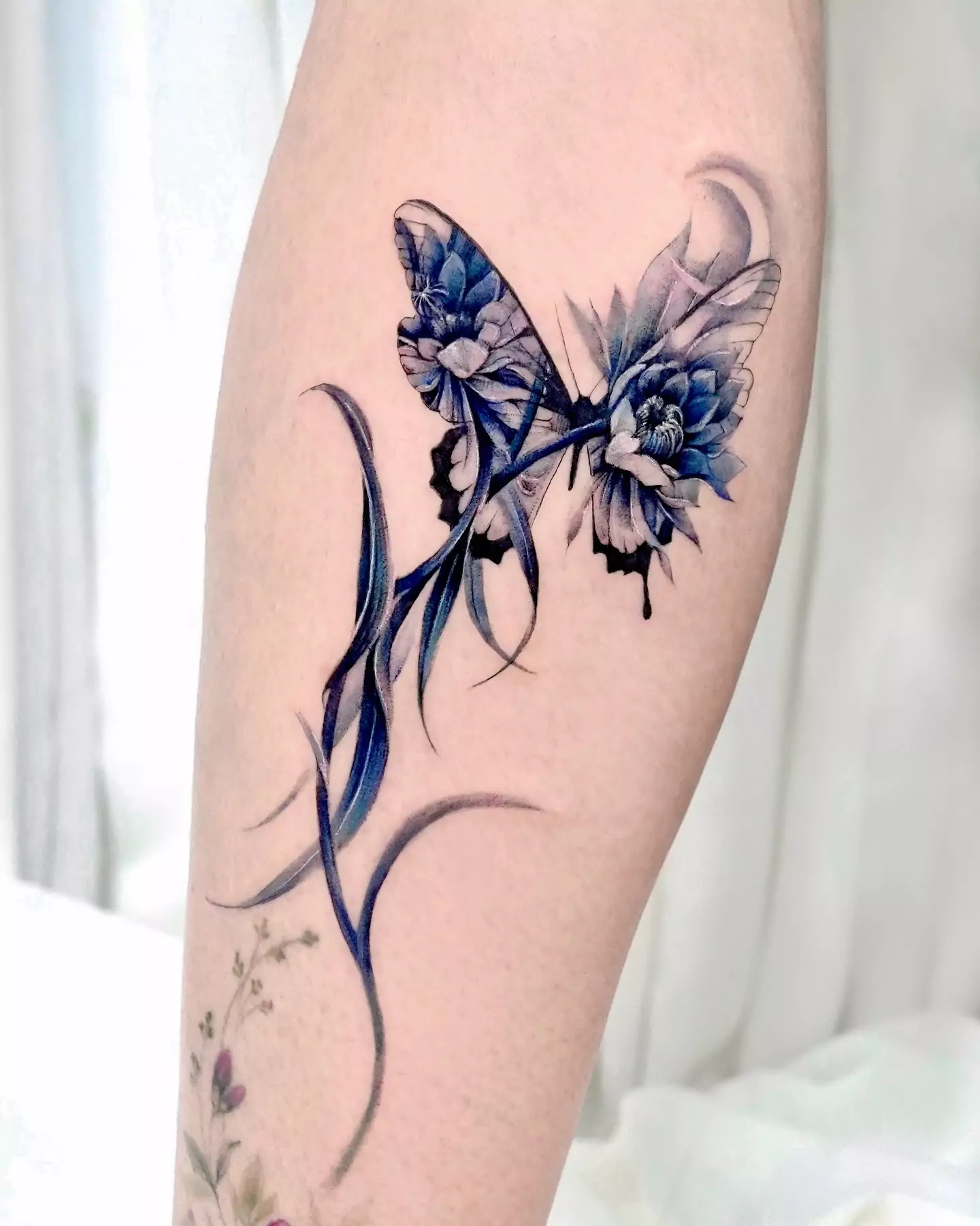 creative butterfly and flower hand tattoo