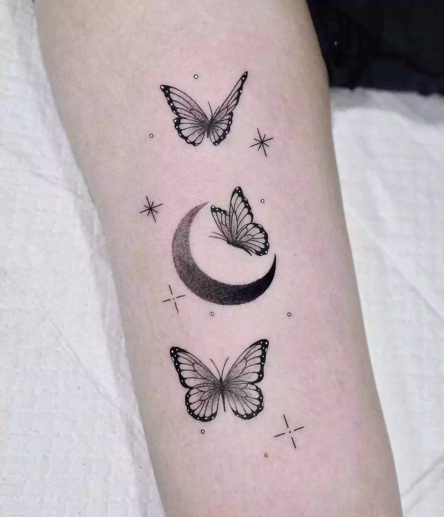 moon and butterfly tattoo