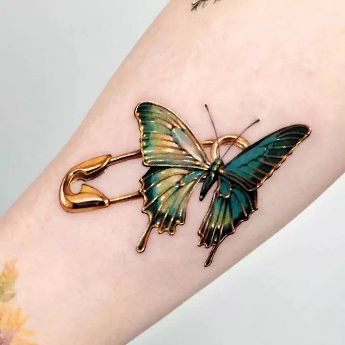 pin and butterfly tattoo