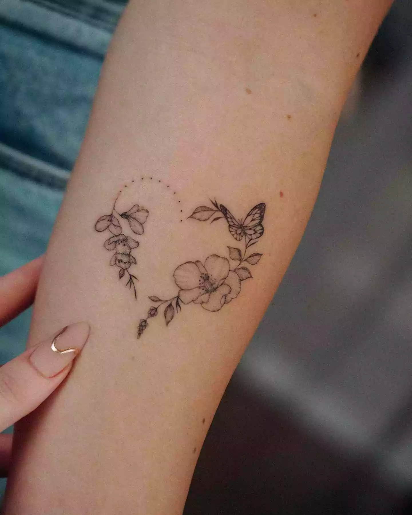 simple flower and butterfly tattoo