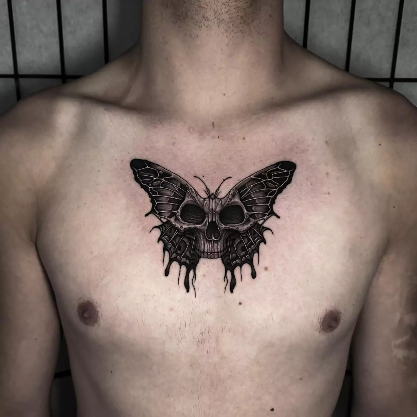 skull and butterfly tattoo