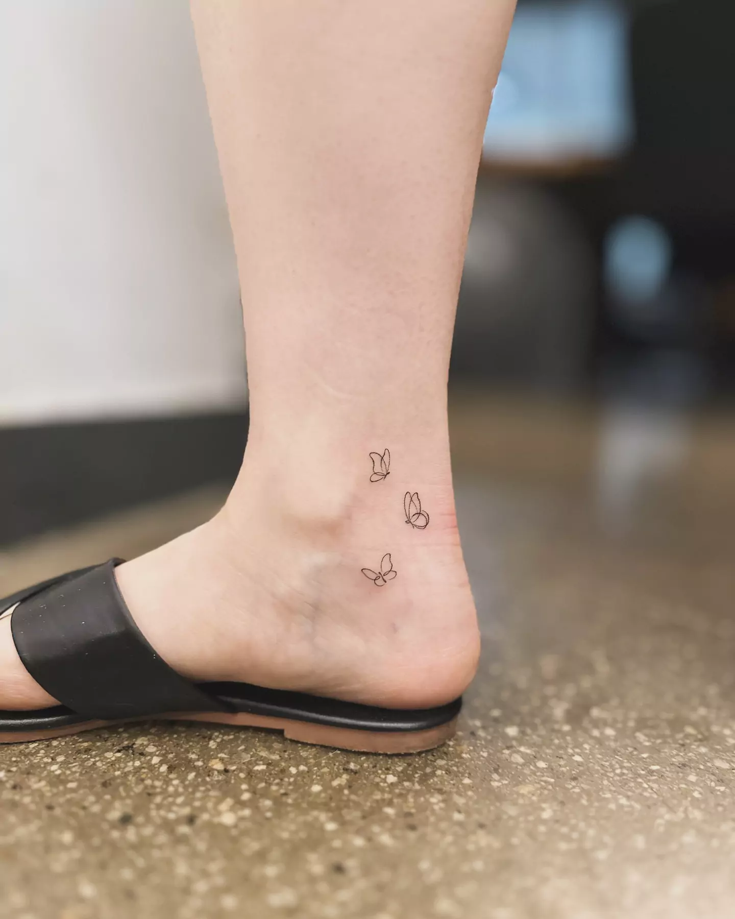 small, cute butterflies tattoos on foot