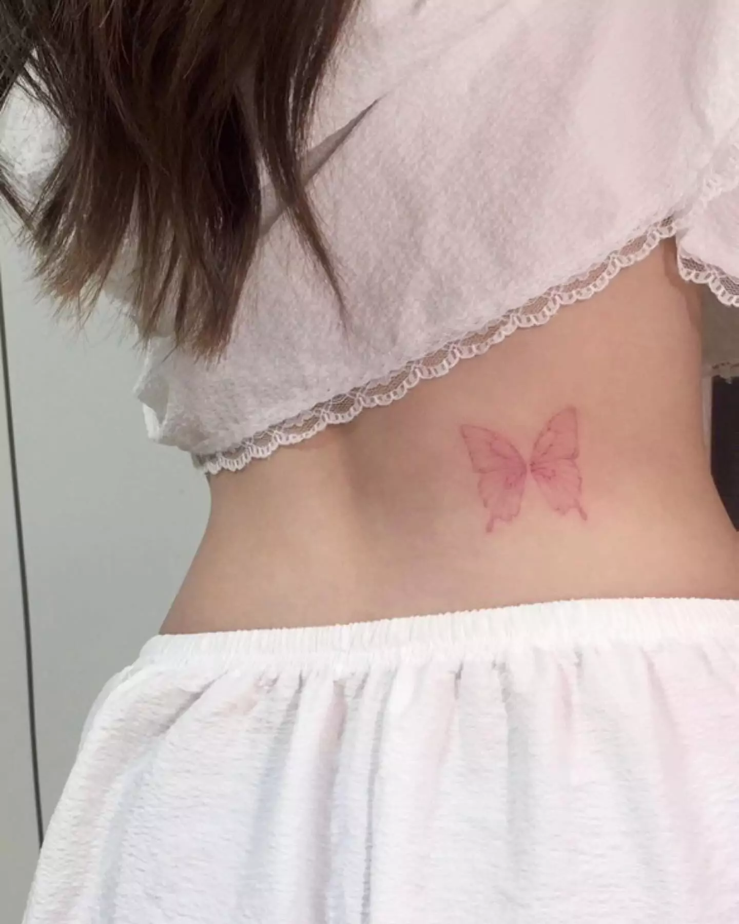 soft color butterfly tattoo