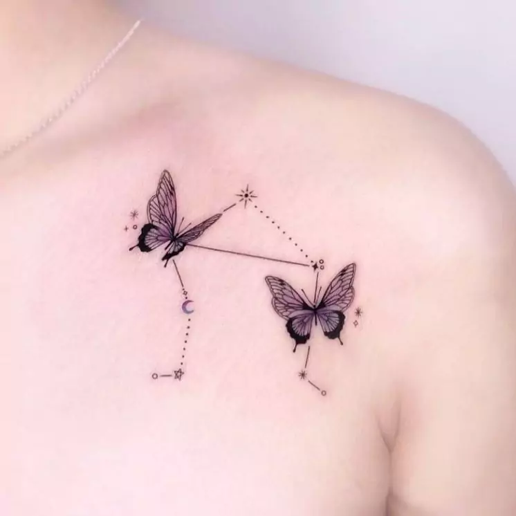 two butterflies and constellation tattoo