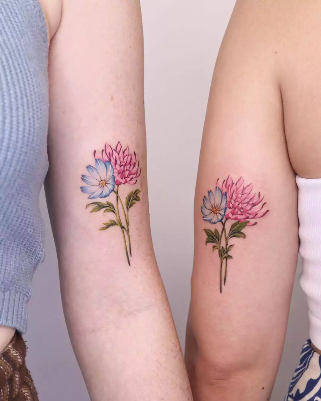 Daisy and Spider lily tattoos for BFF
