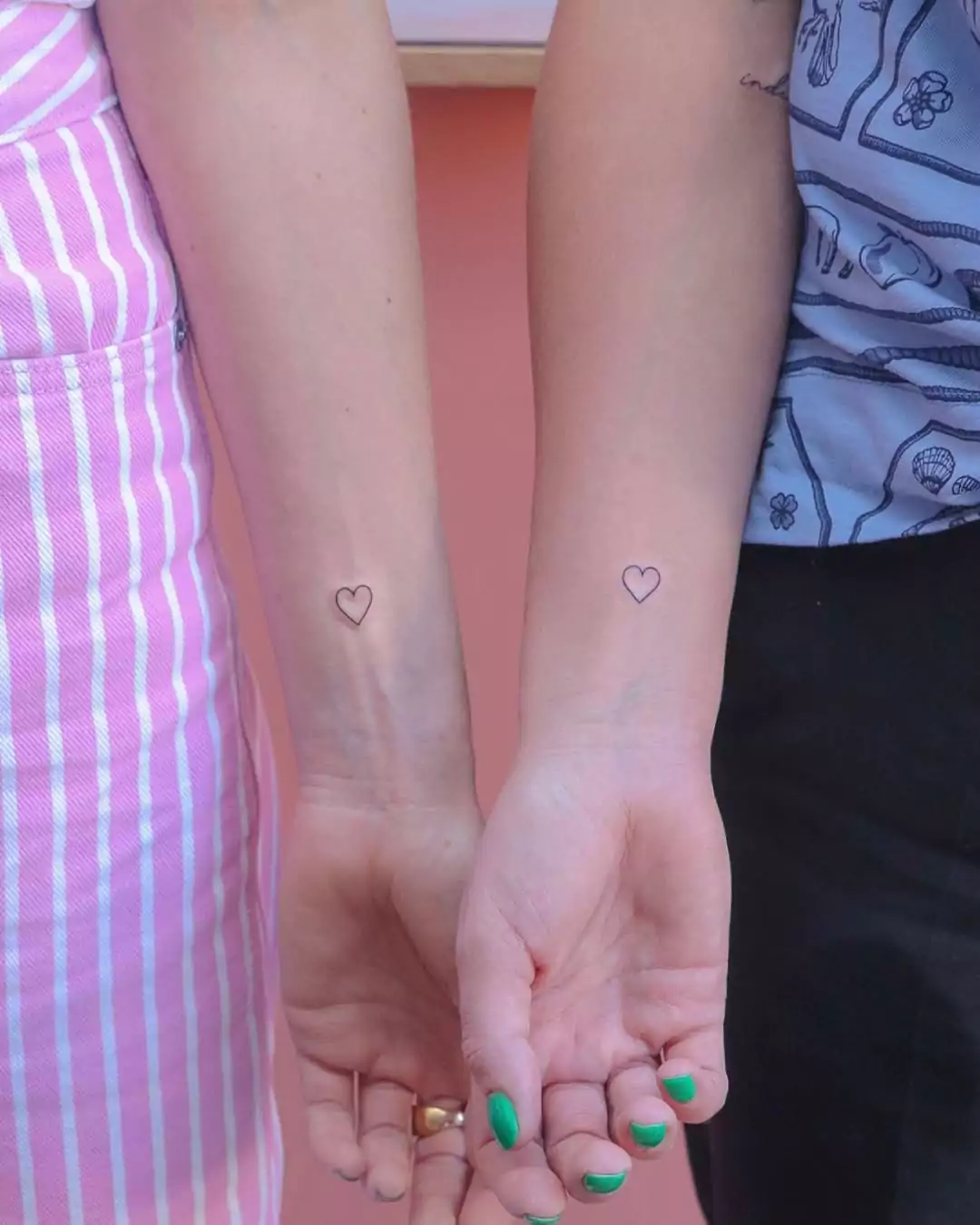 Matching Hearts friends' tattoos