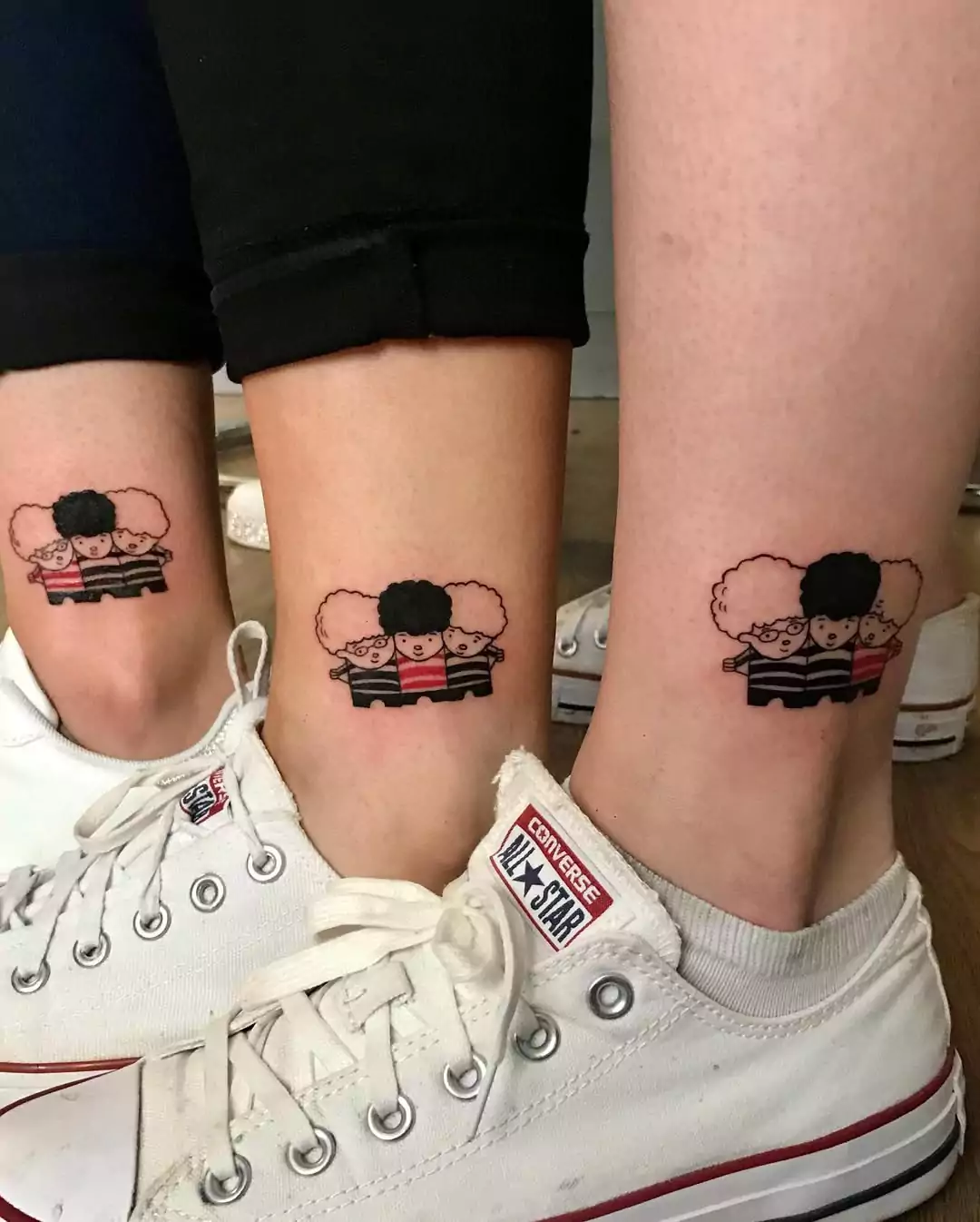 Three friends with matching tattoos for best friends