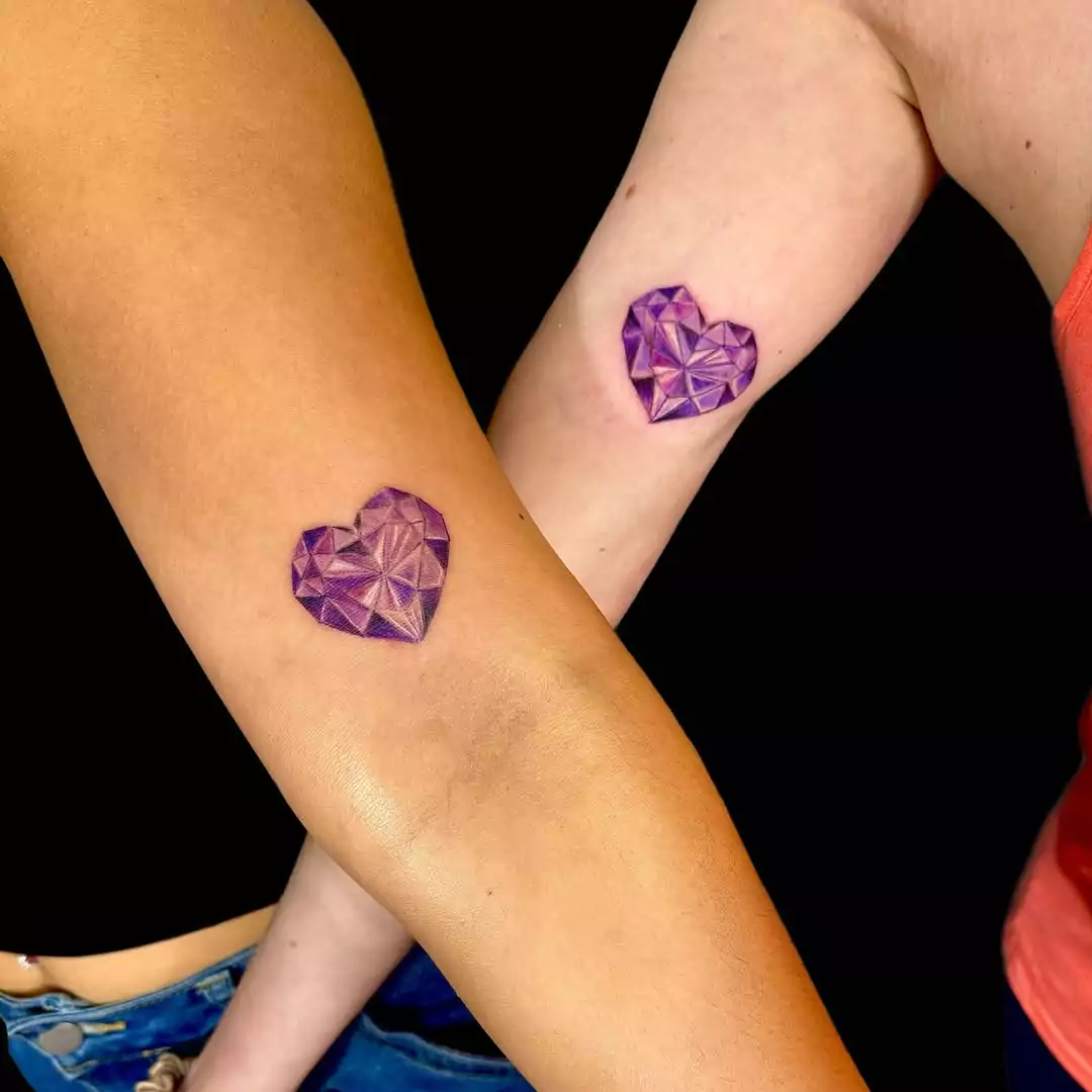 colorful Matching Hearts friends' tattoos