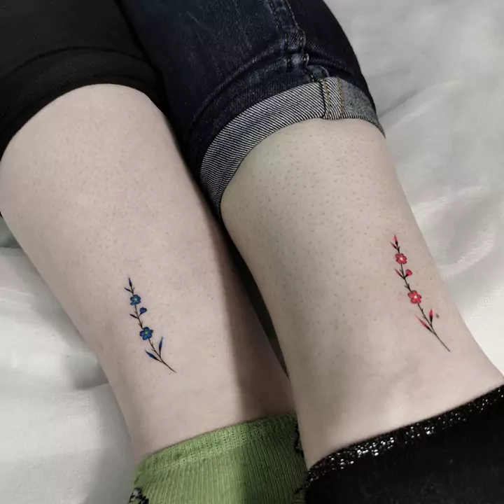flower tattoos for friends on the leg