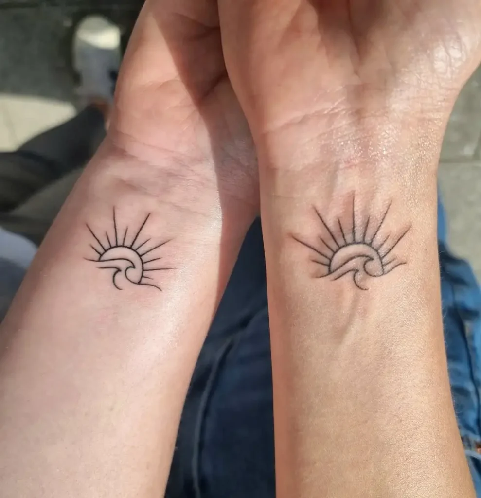 sun, moon and waves tattoo