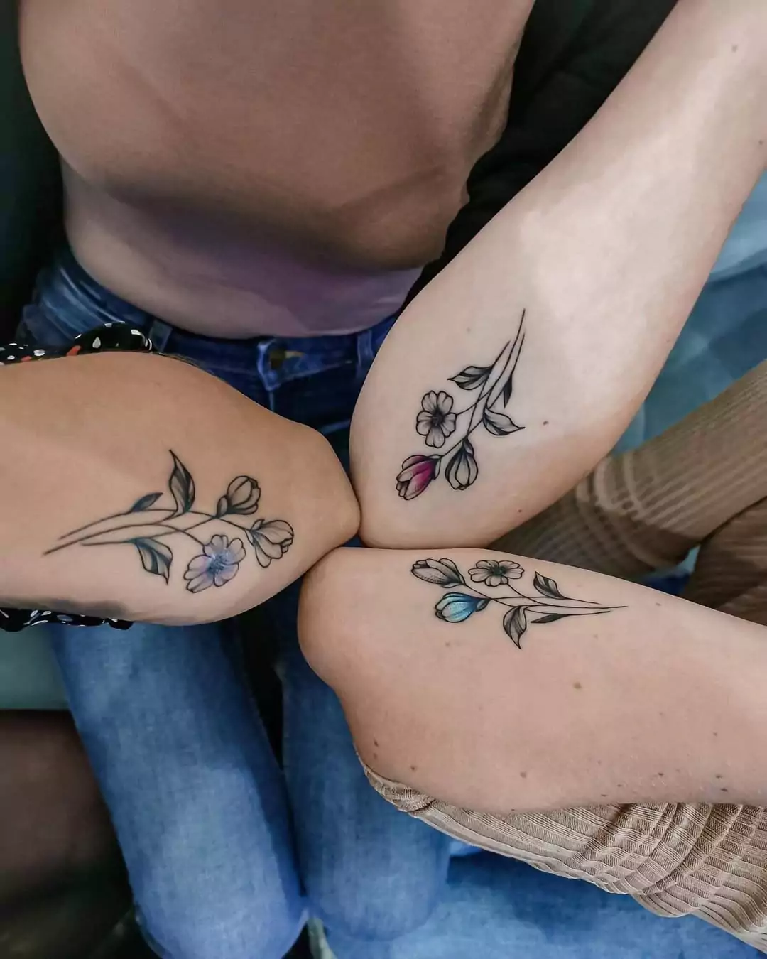 three creative matching flower tattoos for best friends